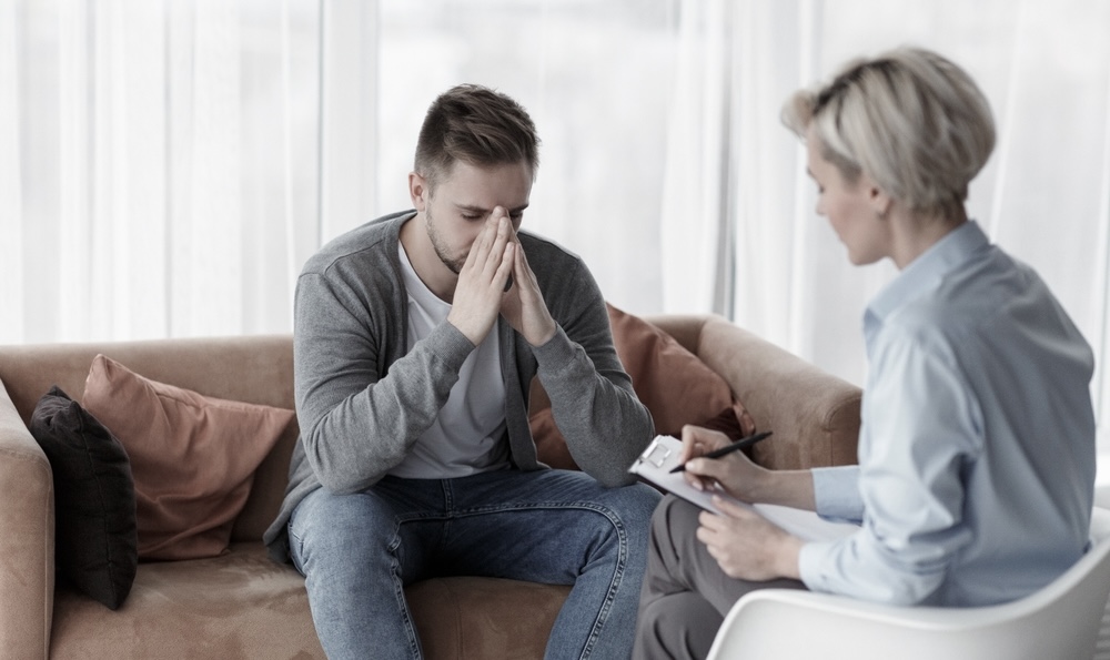 Man in therapy for dual diagnosis depression and addiction