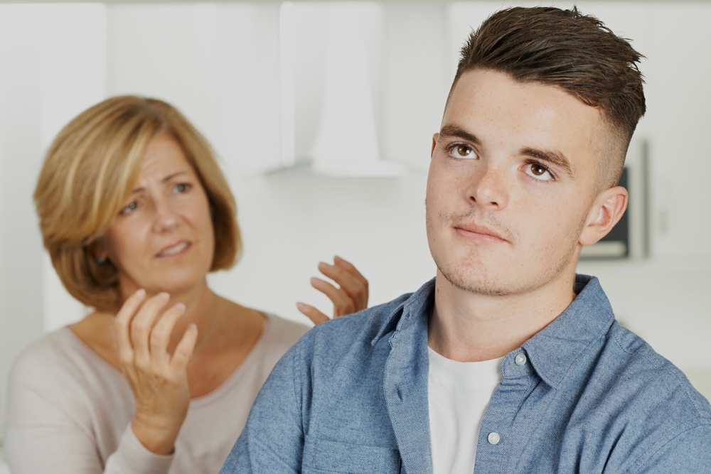 Depressed mom reasoning with her teen son