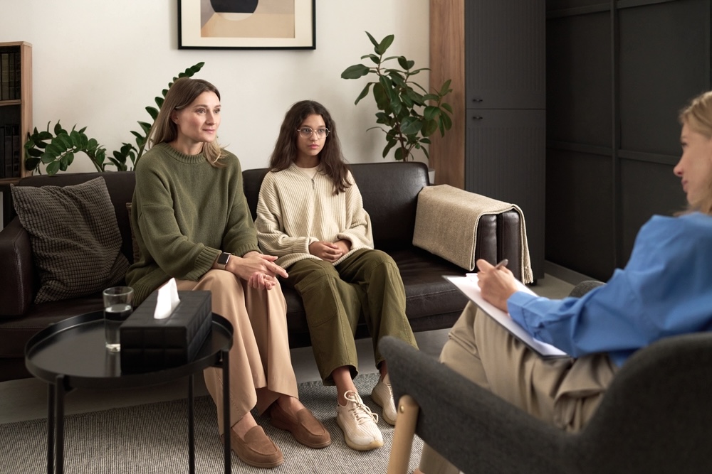 Mother and teenage daughter consulting a mental health specialist in Lancaster CA