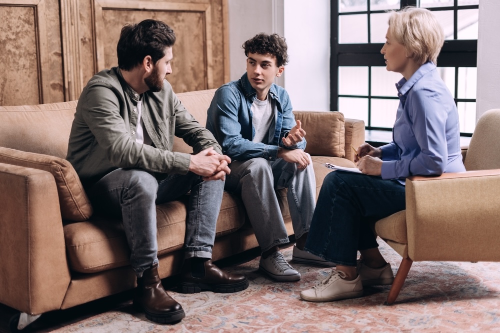 Father with his son during family support therapy